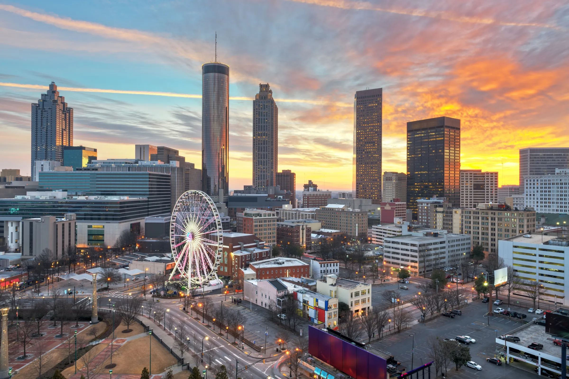 The Atlanta skyline and SkyView Ferris wheel at sunset